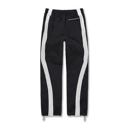 Jordan Craig Velocity nylon track pant in black with twin white side stripes