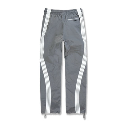Jordan Craig Velocity nylon track pant in charcoal with twin white side stripes