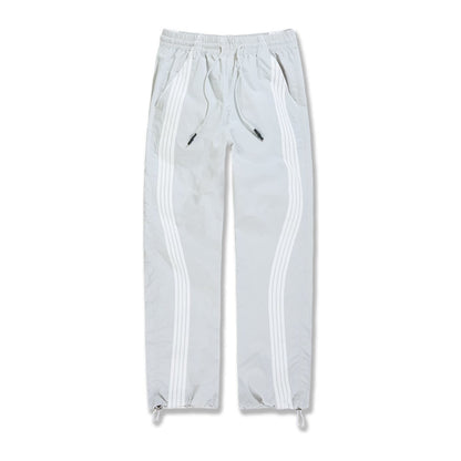 Jordan Craig Velocity nylon track pant in light grey with twin white side stripes