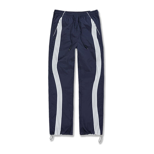 Jordan Craig Velocity nylon track pant in navy with twin white side stripes