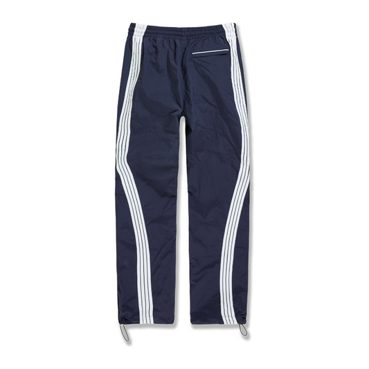 Jordan Craig Velocity nylon track pant in navy with twin white side stripes